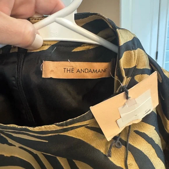 NWT mini dress 
This is the cutest dress. Very nice material. Sold out online. - Picture 8 of 10